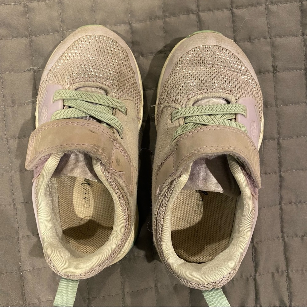 Purple and mint tennis shoes